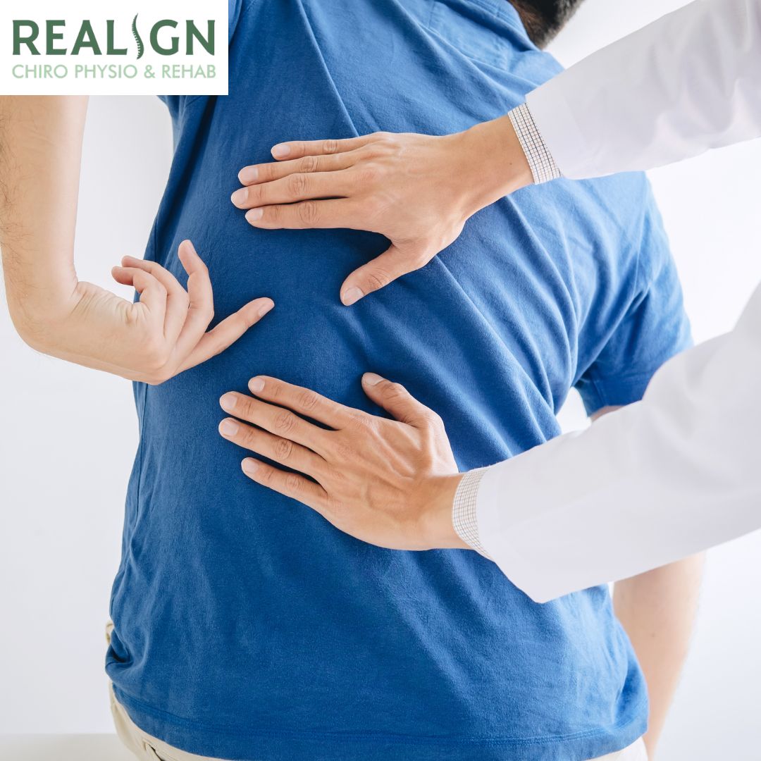 Chiropractor in Langley BC treating patient at Realign Clinic